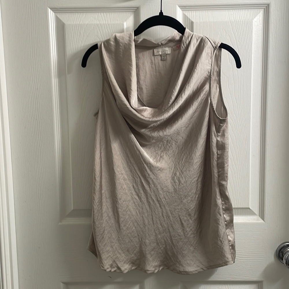 The limited scandal collection blouse size small. No damage, silky.